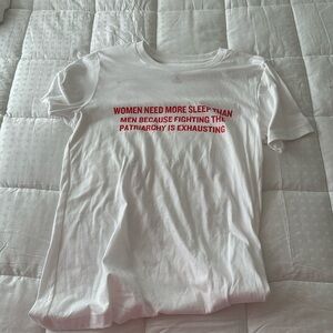 White tee shirt with pinkish red font